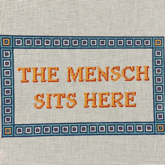 The mensch sits here