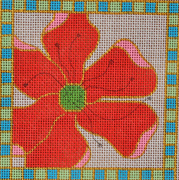 Floral design on fabric with a red flower and green center, surrounded by a colorful border.