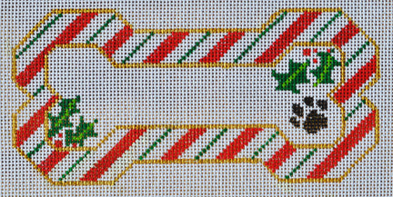 Holiday dog bone needlepoint canvas with candy cane stripes and paw print.