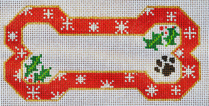 Decorative dog bone with Christmas elements on a red background