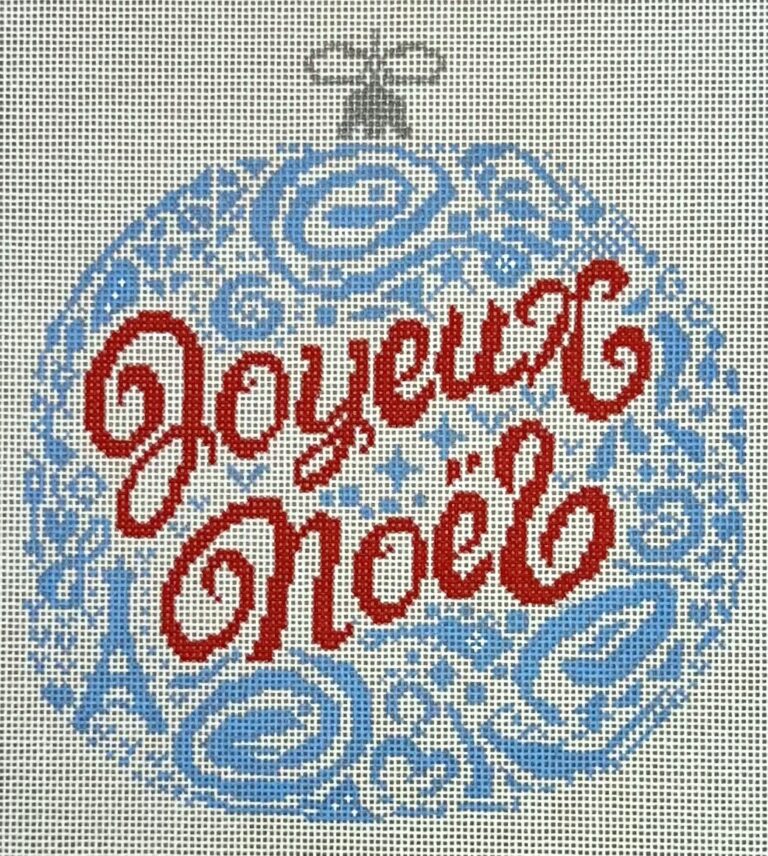 Decorative design with 'Joyeux Noel' text in red on a blue patterned background