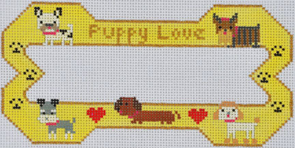 Cross-stitched design of a bone-shaped frame with cartoon dogs and text 'Puppy Love' on a yellow background.