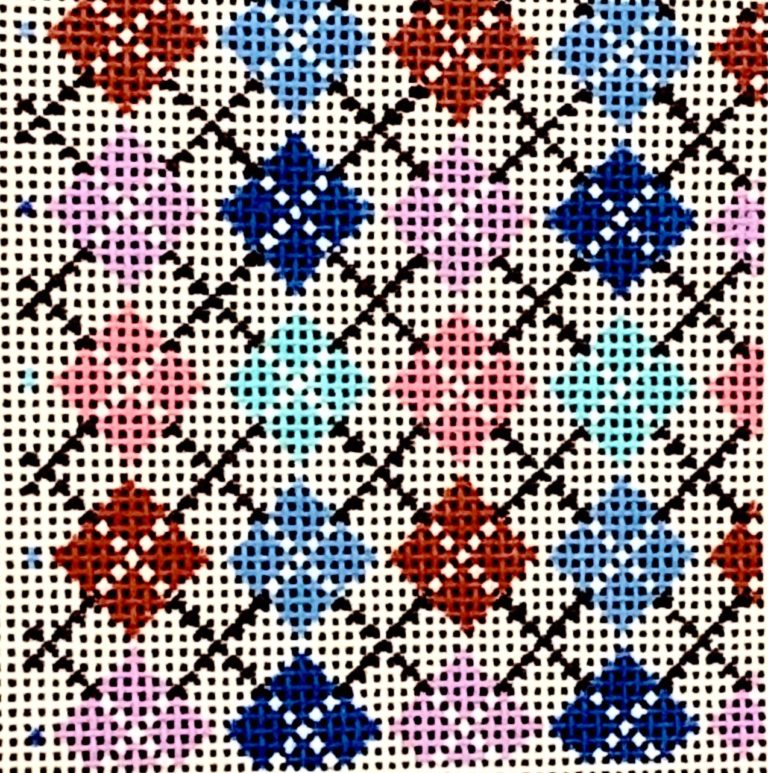 Cross-stitched pattern with red, blue, and pink geometric shapes on a white background