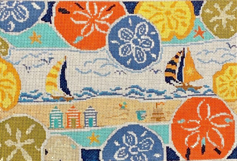 Patterned fabric with sailboats, sand dollars, and beach houses.