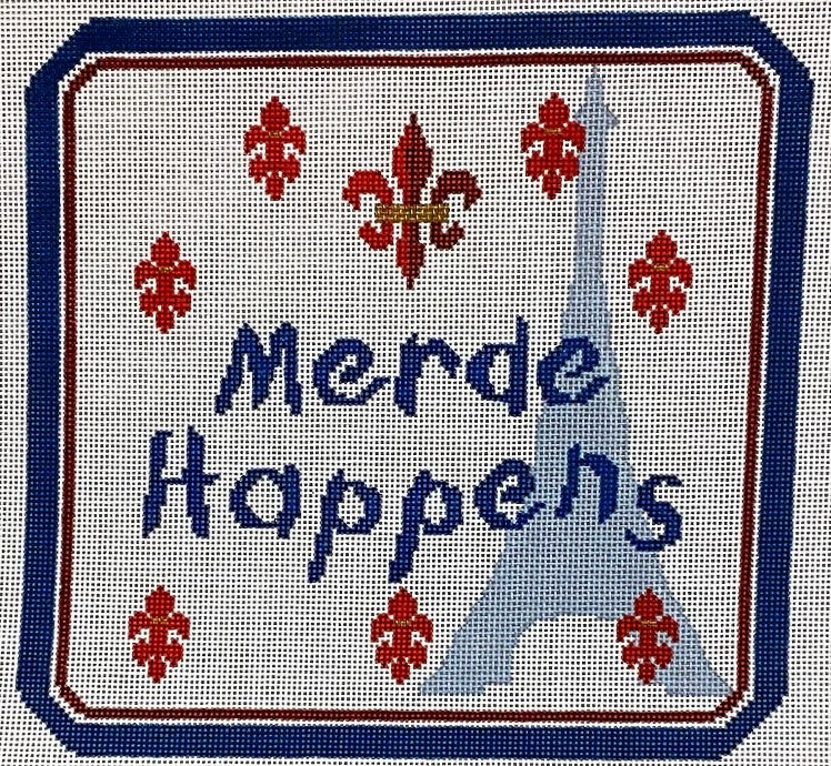 Embroidered patch with 'Merde Happens' text and decorative border