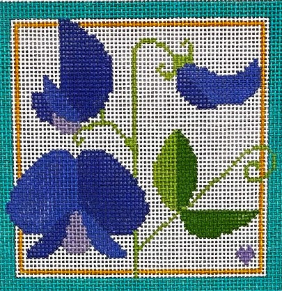 Decorative design of blue flowers and green leaves on a white background with a gold border.