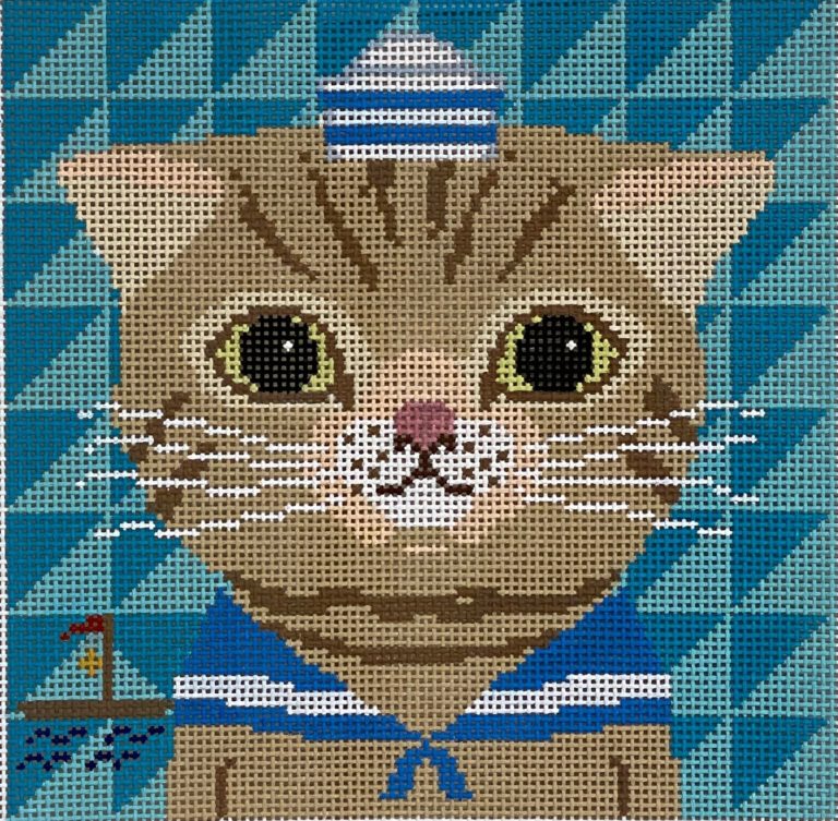 Cat in a sailor outfit with blue triangles in the background