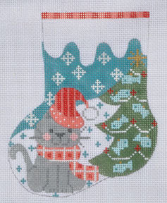 Cross-stitched design of a cat in a Christmas stocking with snowflakes and a tree.