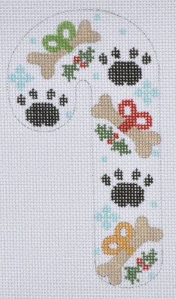 Cross-stitched design of a candy cane with paw prints and bones on a light blue background