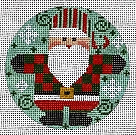 Cross-stitched design of a Santa Claus figure in a wreath