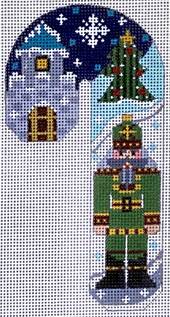 Decorative candy cane with a nutcracker design on a blue background