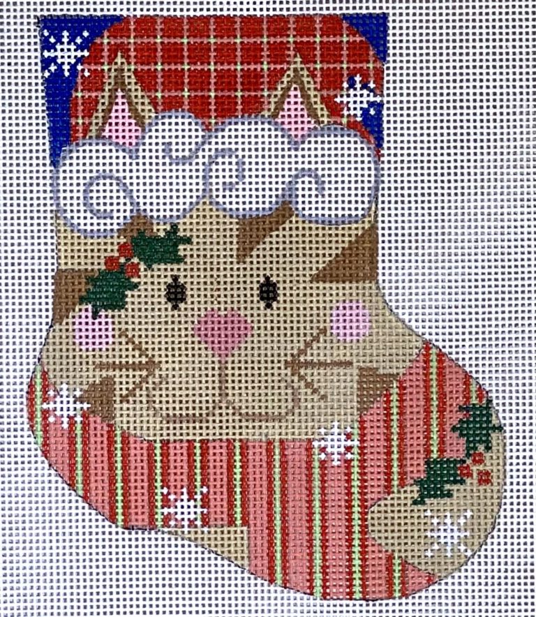 Decorative Christmas stocking with reindeer design on a white background