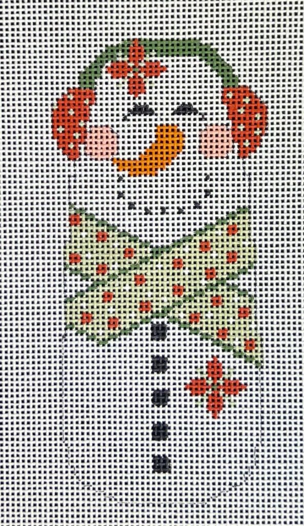 Cross-stitched snowman with a wreath on a white background