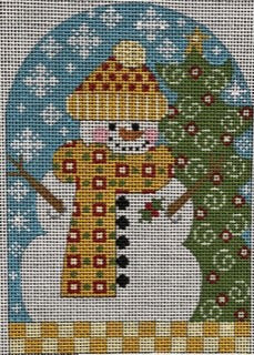 Cross-stitched snowman with a tree in a snowy landscape