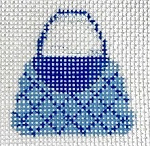 Blue handbag pattern on a cross-stitch grid