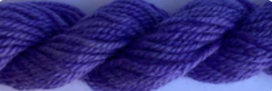 A close-up of thick twisted yarn in a medium-to-deep purple color.