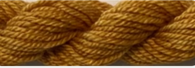 A close-up of a twisted skein of yarn in a warm mustard yellow color.
