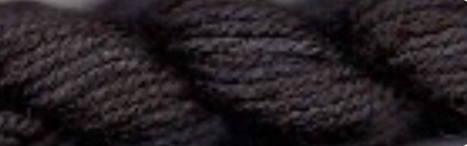 A close-up of dark charcoal gray twisted yarn texture.