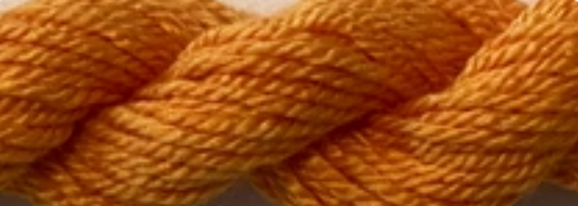 A close-up of twisted yarn or thread in a warm golden yellow-orange color, filling the frame.