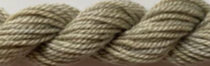 Close-up of a thick twisted rope or yarn in a light beige and gray color.
