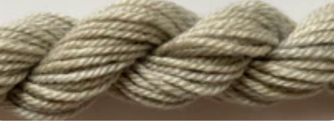 Twisted cotton rope or yarn in a light beige or oatmeal color, showing the texture of the fibers.