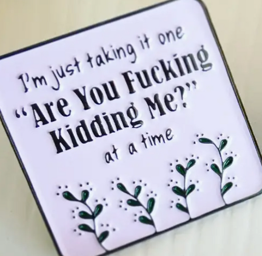 Humor enamel pin
